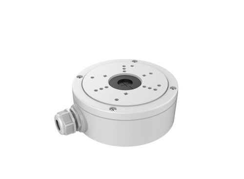 White circular device with a side threaded connector and multiple small top screw holes; appears to be a mounting base or sensor enclosure.
